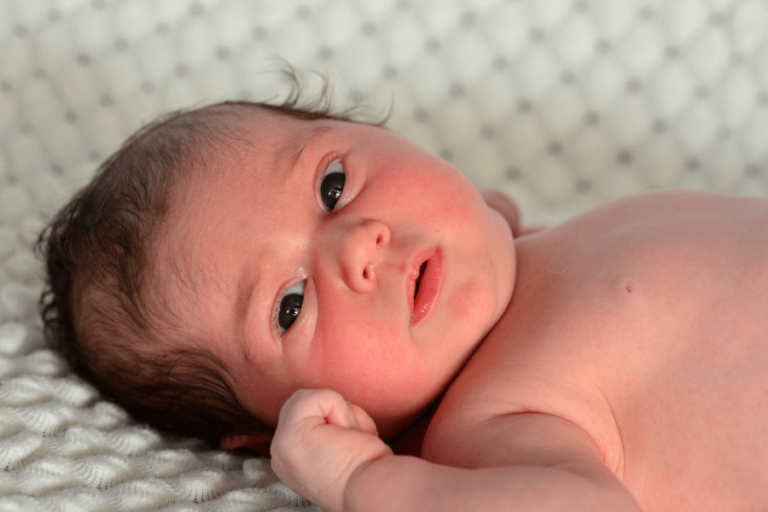 newborn fighting sleep